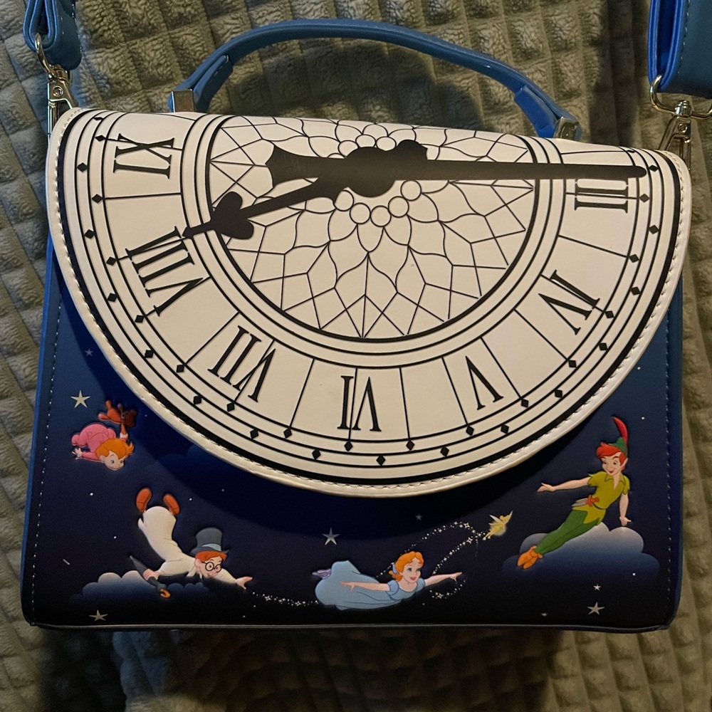 Disney Loungefly Peter Pan crossbody/top handle w/glow in the dark clock/stars